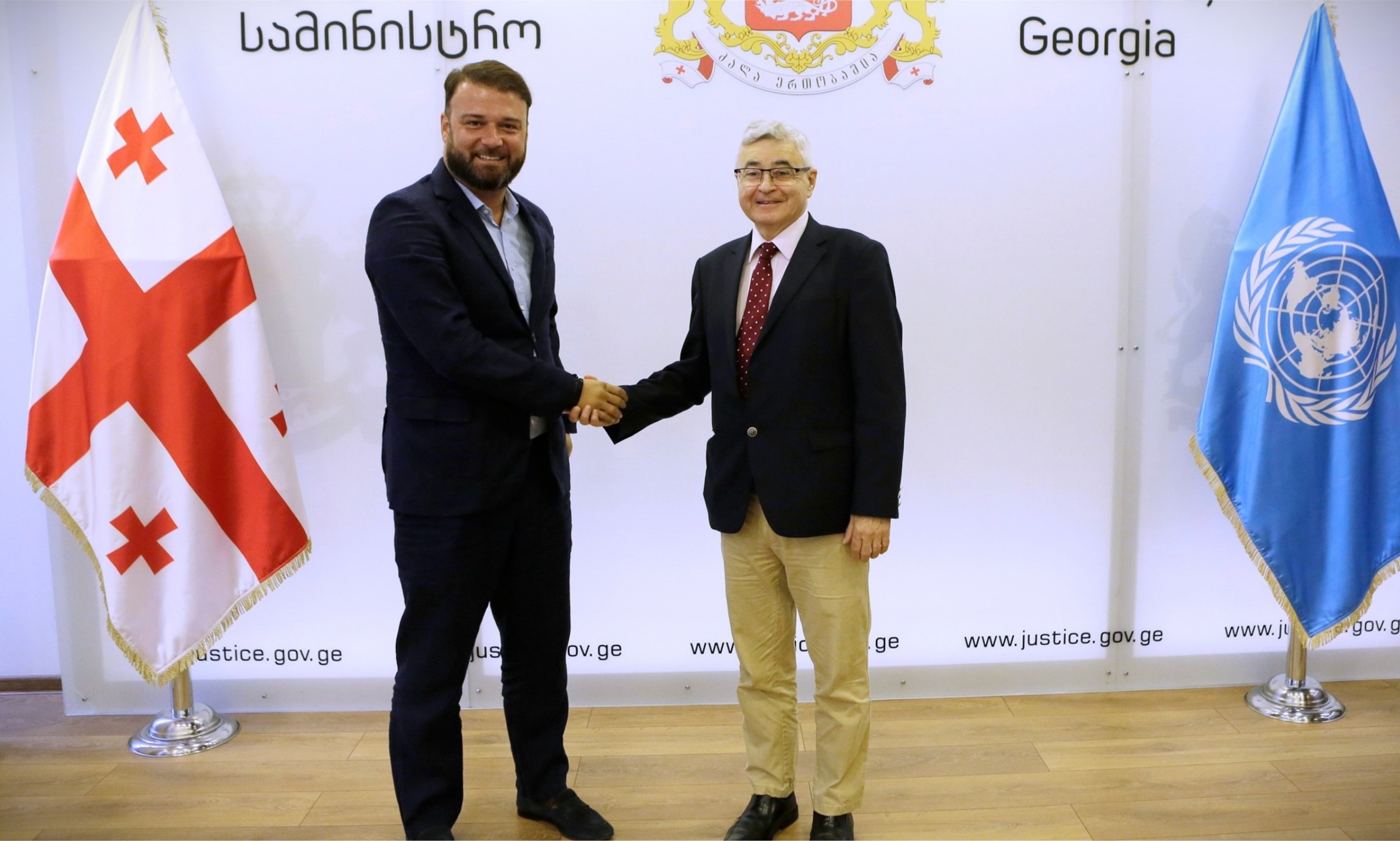The Special Rapporteur shaking hands with the Georgian minister of Justice.